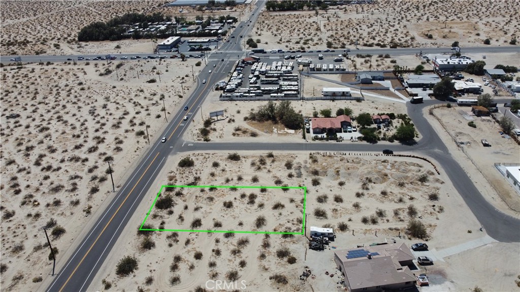 Exceptional opportunity to acquire a well-located vacant lot on Dillon Road in Desert Hot Springs, just off Palm Drive with high visibility and convenient access to I-10 and Palm Springs. Zoned W-2 (Control Development Areas)., this versatile zoning allows for a variety of uses. The property features a flat, buildable terrain ideal for storage a small industrial building, or as a land-banking investment in a rapidly growing corridor. Located near established commercial businesses and residential developments. This lot offers excellent frontage along Dillon Rd, ensuring ease of access and exposure for future operations.