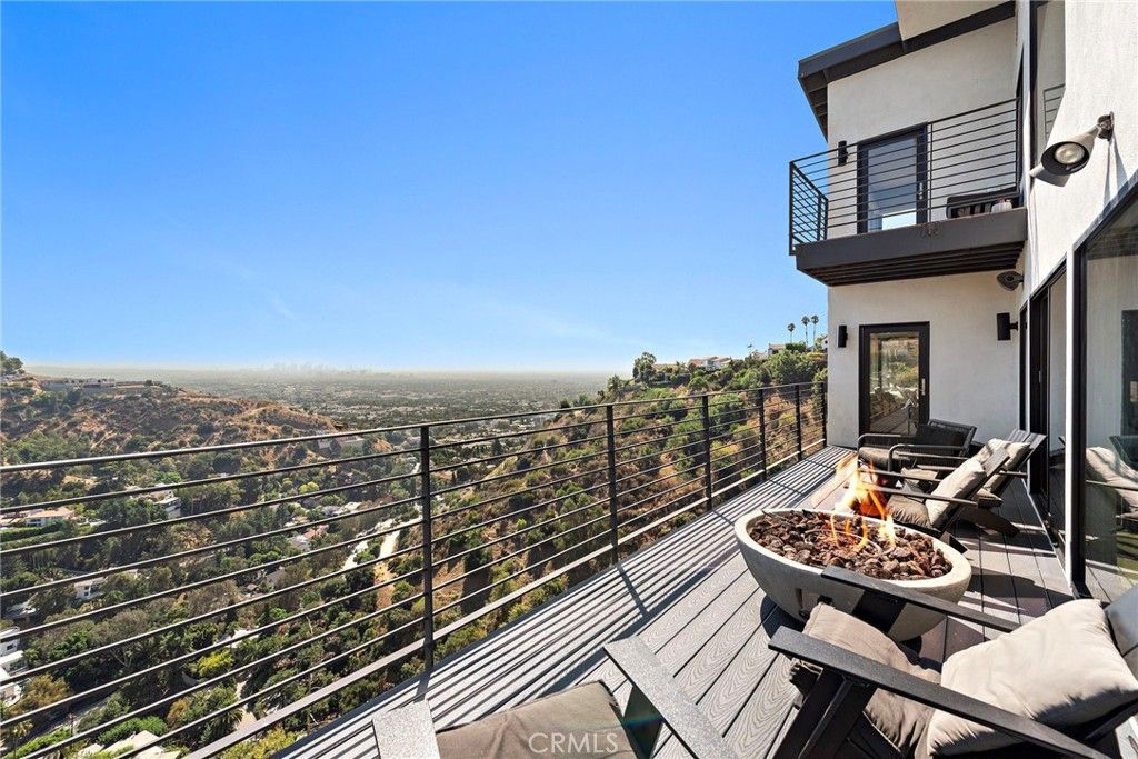 Photo of 8179 Mannix Drive, Los Angeles, CA 90046 (MLS # OC25051637)