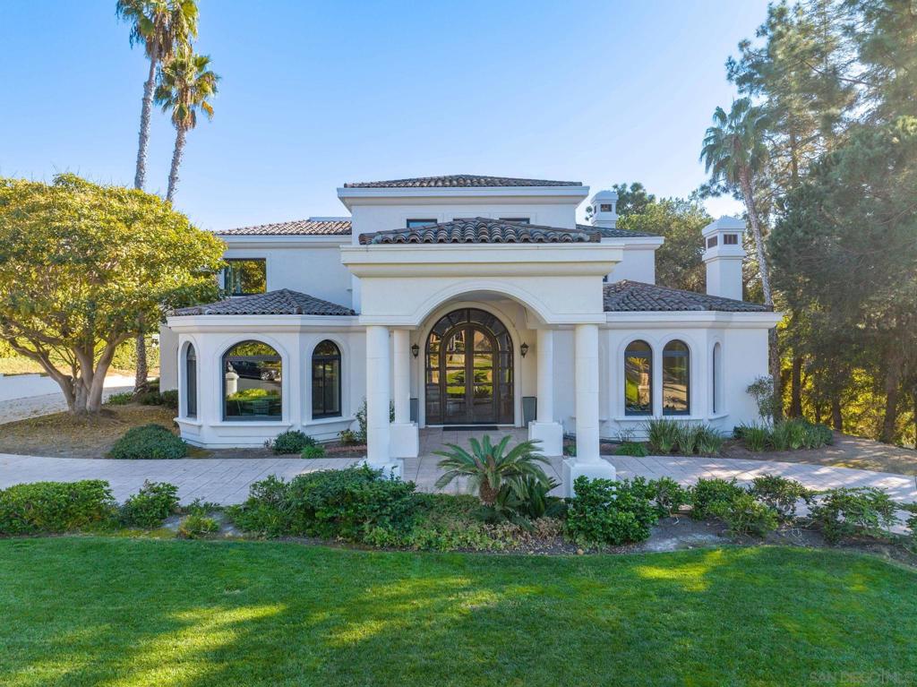 Inviting and beautiful Custom Estate is located in the finest coveted north side of Fairbanks Ranch, just a short walk from the community lake, tennis courts and clubhouse. Over 8248 sq ft of luxury and space! House boasts 5 en-suite bedrooms, wood panelled office, home theater, gym and a great size bonus room to enjoy. Grounds include a beautiful pool, spa, outdoor barbeque, open area for kids to play. BEST BUY IN FAIRBANKS RANCH! The formal entrance boasts a grand wrought iron stairway with double story ceilings. It takes you to 3 en-suite bedrooms, a bonus room, and a perfect master bedroom retreat with his & her bathrooms and closets plus a huge balcony. Marble flooring majestically adorn the first floor, where you will find a formal living room embellished with a beautiful fireplace mantel, a wood paneled office, home theater, gym and en-suite guest bedroom. In the Formal dining room you can host the most memorable dinners. Recently remodeled kitchen with newer appliances, home theather, gym, new flooring throughout and so much more to see and appreciate.Grounds include beautiful pool, spa, outdoor barbeque, open area for kids to play.