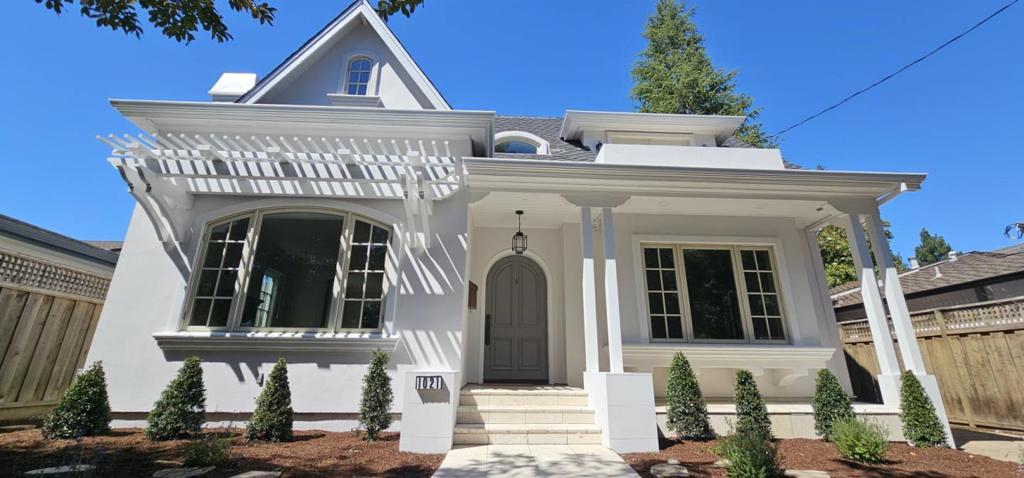 Elegant and timeless, this custom-built 2004 residence in Palo Altos prestigious Crescent Park neighborhood combines enduring craftsmanship with modern comfort. The homes refined white façade and landscaped front entry welcome you along most picturesque tree-lined streets. Inside, a grand foyer with soaring ceilings introduces a spacious and light-filled interior. Distinctive ceiling lines, arched hallways, and custom millwork add architectural character throughout, while rich hardwood floors, stone finishes, and designer lighting provide a sophisticated yet inviting atmosphere. The living room, flows seamlessly into the formal dining room, making it ideal for both intimate gatherings and elegant entertaining. A chefs kitchen with professional-grade appliances opens to a casual dining area and family room, where large windows overlook the serene backyard. The main level also features a bedroom and a full bathroom, offering flexibility for guests or multi-generational living. Upstairs, the primary suite serves as a private retreat with vaulted ceilings, symmetric windows, a walk-in closet, and a spa-inspired bathroom featuring a double vanity, walk-in shower, tub, and stone countertops. Additional bedrooms offer bright and versatile spaces for family, guests, or a home office.