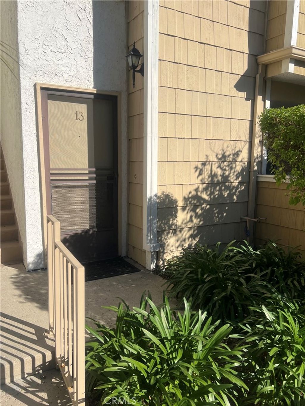 Photo of 18408 Hatteras St #13, Tarzana, CA 91356 (MLS # SR26040784)