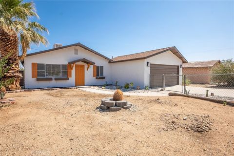 Photo of 73570 Cedar Drive, 29 Palms, CA 92277 (MLS # JT25144147) Photo of 73570 Cedar Drive, 29 Palms, CA 92277 (MLS # JT25144147)