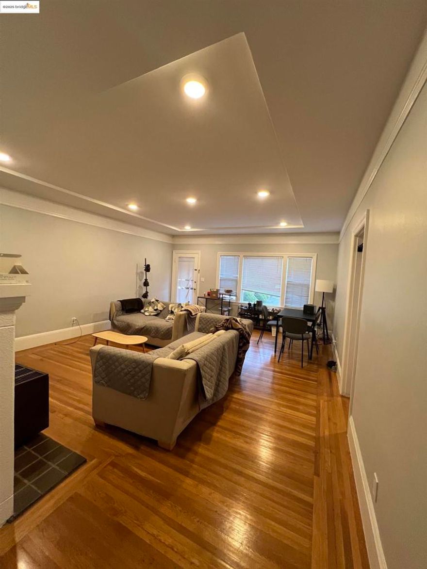 A spacious 3BR, 2BA upper-level unit near UC Berkeley, offering an exceptional layout and abundant natural light. Features include refinished oak hardwood floors, a large living room with recessed lighting, elegant ceiling accents, and a decorative fireplace. The updated kitchen provides ample storage, while two fully remodeled bathrooms and a private tankless water heater ensure comfort. Ideally located near the Gourmet Ghetto, BART, farmers market, shops, cafés, and restaurants—this home blends academic focus with vibrant city​​‌​​​​‌​​‌‌​​‌​​​‌‌​​​‌​​‌‌​​​‌​‌​​​‌‌​ living.