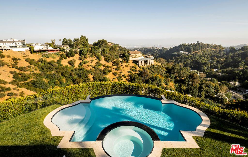 Photo of 10932 Savona Road, Los Angeles, CA 90077 (MLS # 25598935)