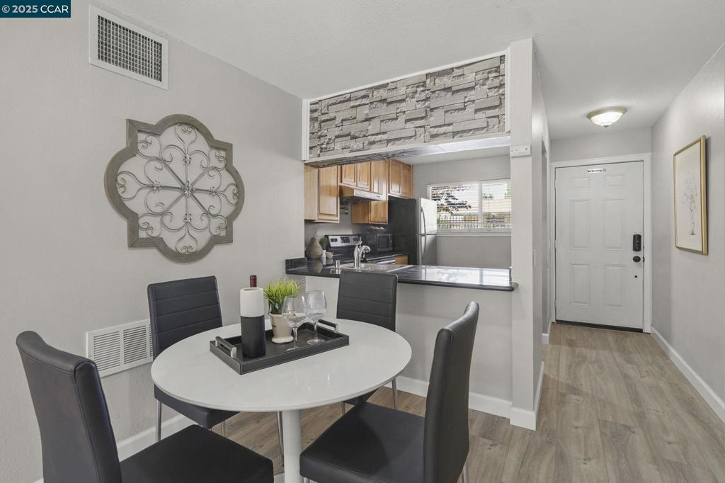 Experience modern living, Live the ultimate urban-suburban lifestyle in this completely remodeled 2-bedroom, 2-bathroom condo. Perfectly positioned for commuters and city-lovers alike, this home is just a short walk or drive to BART and bus transportation, putting the entire Bay Area within reach. Inside, the unit is a showcase of modern upgrades, including new laminate flooring, fresh paint, and a fully updated kitchen with stainless steel appliances. Both bathrooms are brand new from top to bottom. With BART, downtown Concord and fantastic shopping options just moments away, you'll love the convenience and comfort this home offers.