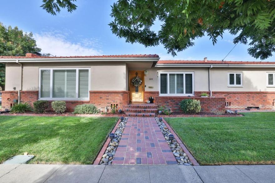 Located in the heart of San Jose, this 3-bedroom, 2-bathroom single-family home offers 1,644 square feet of living space with an additional finished basement, providing extra storage and is perfect for an additional living area or home office. Boasting beautiful hardwood floors throughout, the home is adorned with dual-paned Anderson and Milgard windows, complemented by elegant plantation shutters. The home features two full bathrooms, including an ensuite master bath and a versatile second bath complete with both a shower and a tub. Experience year-round comfort with central air conditioning and heating. Step outside to a charming backyard with pavers, ideal for relaxation or entertaining. Enjoy seamless commuting with easy access to major highways and proximity to San Jose Airport. The vibrant local scene offers access to Japantown, a weekly farmers market, Downtown San Jose, an array of dining options, the SAP Center, light rail, Caltrain, and nearby parks.