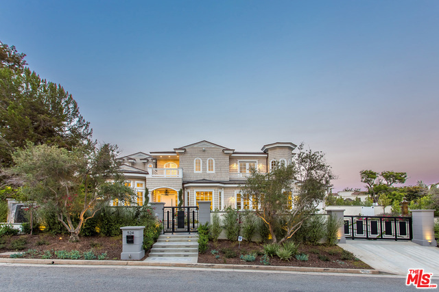 Located on one of Brentwoods most prestigious streets, this newly custom built six bedroom eight bathroom home offers it all. Gated and private, this beautiful home is equipped with a chefs kitchen with Wolf and Sub-Zero appliances, Control 4 system that controls all lighting and surround sound. Living room and "great room" open to beautiful deck with infinity edge pool and spa along with outdoor cabana, outdoor kitchen and fire pit. Master bedroom features include fireplace, balcony with ocean views, dual closets and a grand master bathroom. Lower level consists of a movie theatre, gym, guest quarters and a wine cellar which holds over 500 bottles. This home MUST be seen in person to fully appreciate.
