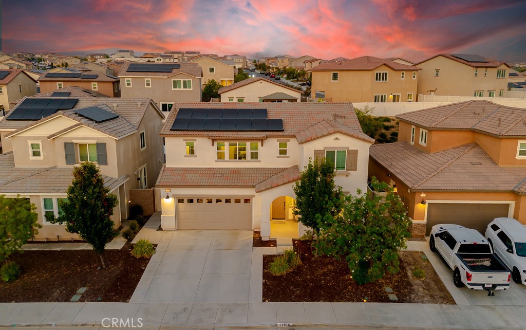 MOVE IN-READY ON a PRIME CUL-DE-SAC****This like-new home sits on a spacious lot in the desirable master planned community of Fairway Canyon. Step inside to luxury vinyl plank flooring, an open-concept layout, and a gourmet kitchen featuring upgraded appliances, rich cabinetry, a large center island, and quartz countertops that seamlessly flow into the expansive great room perfect for entertaining. Downstairs offers a full bedroom and bathroom, ideal for guests or multi-gen living. Upstairs, you'll find a versatile loft, a spacious primary retreat with a walk-in closet, and a spa-inspired bath with dual sinks, a soaking tub, and a separate shower. All secondary bedrooms are generously sized, and the upstairs laundry room includes a massive linen/storage closet. Step outside to your beautifully landscaped backyard featuring custom stamped concrete, drought-tolerant landscaping, and room to create your dream outdoor space...think BBQs, gardening, or even a future pool. Energy-efficient features include a solar system and smart home upgrades throughout. Enjoy access to top-tier community amenities: two pools, spa, splash pad, dog park, clubhouse, gym, walking trails, and a nearby golf course. Conveniently located near top-rated schools, shopping, dining, and major freeways. ***All offers will be reviewed on August 26, 2025***Professional photos and video to follow. This home is the perfect blend of comfort, energy-efficiency, and community living. Don’t miss it!