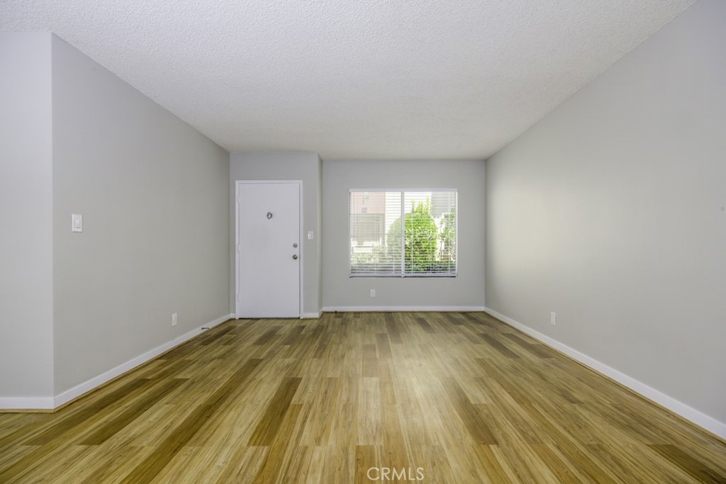 Wonderful opportunity to live in the heart of Downtown Long Beach in a spacious downstairs 2 bedrooms, 2 bath "Own your Own" unit with lots of natural light, upgraded kitchen cabinets and new beautiful quartz counters in kitchen and bathroom, large main bedroom with brand new beautiful shower sliding doors bathroom, new carpet in bedrooms, generous space closets and plenty of storage. Front large balcony, building with open courtyard, community laundry room. Fabulous location close to The Pike, Shoreline, Pine Ave, Convention Center, East Village, access to freeways and public transportation.