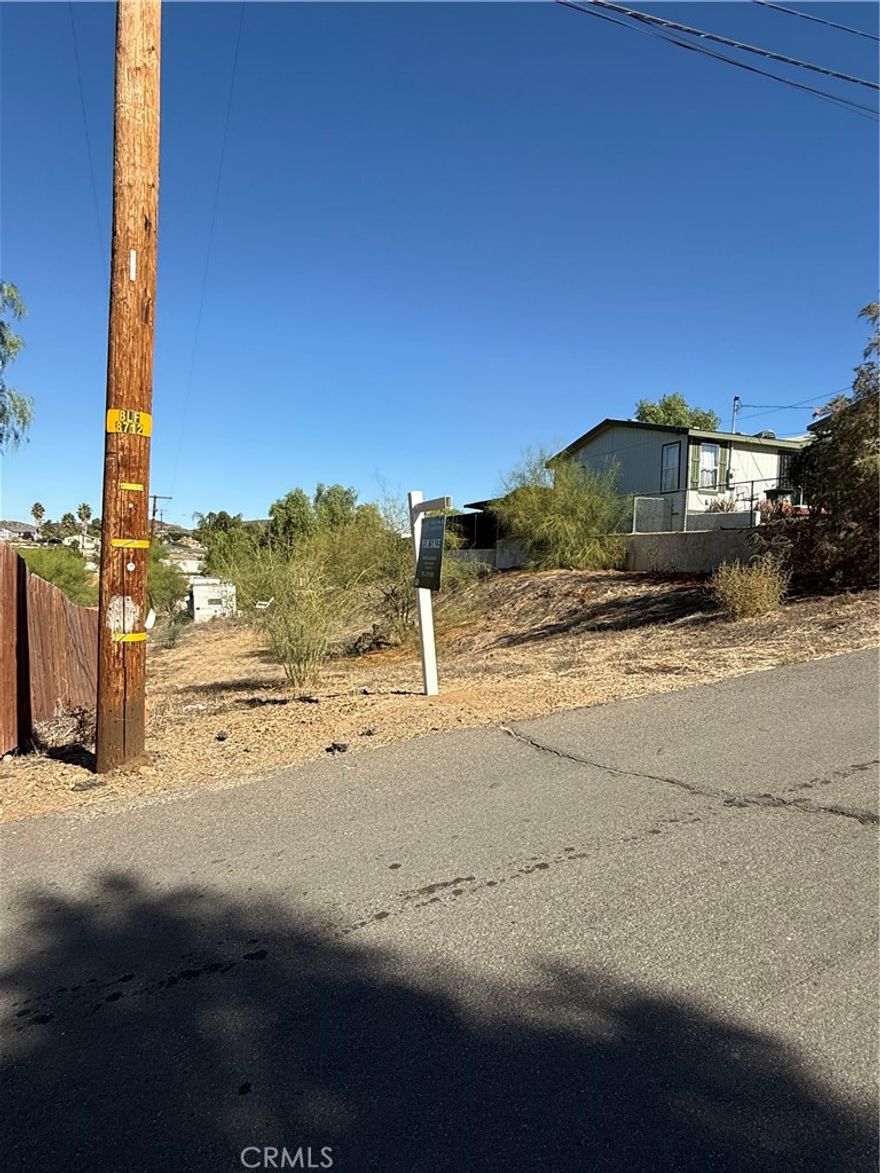 Own a Piece of land in this Growing Community. Located on a Paved Road. Lot size is 50 x 100. Check with City for planning. Property is part of the Moratorium. Electricity right in front of lot.