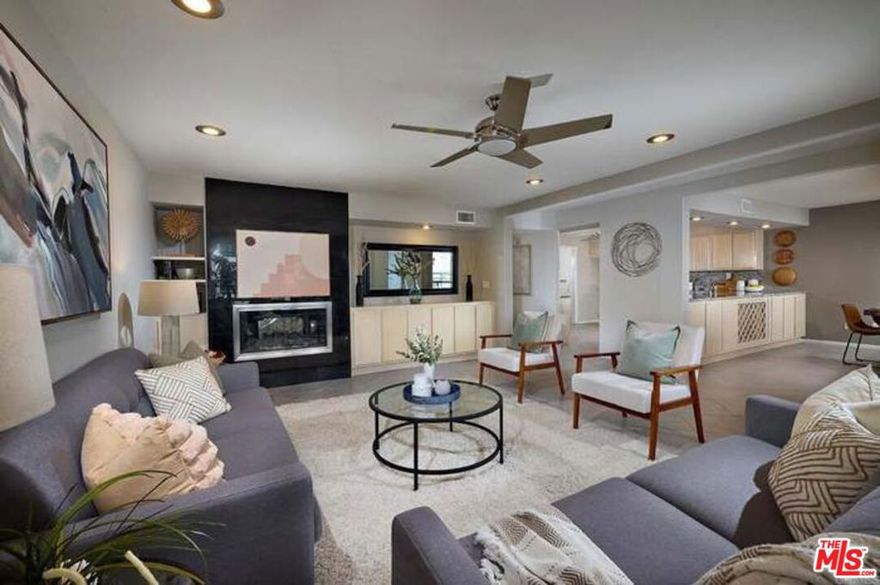 This is a large-spacious OPEN floor plan containing tons of modern features and a designer kitchen with upgraded quality appliances.  Property contains two Master suites. There is a gas fireplace in living room and there are three balconies. Both bathrooms are spectacular and closet space is plentiful, Complex has a pool and jacuzzi, also a huge deck facing the Omni Resort golf course, Two parking spaces are included.