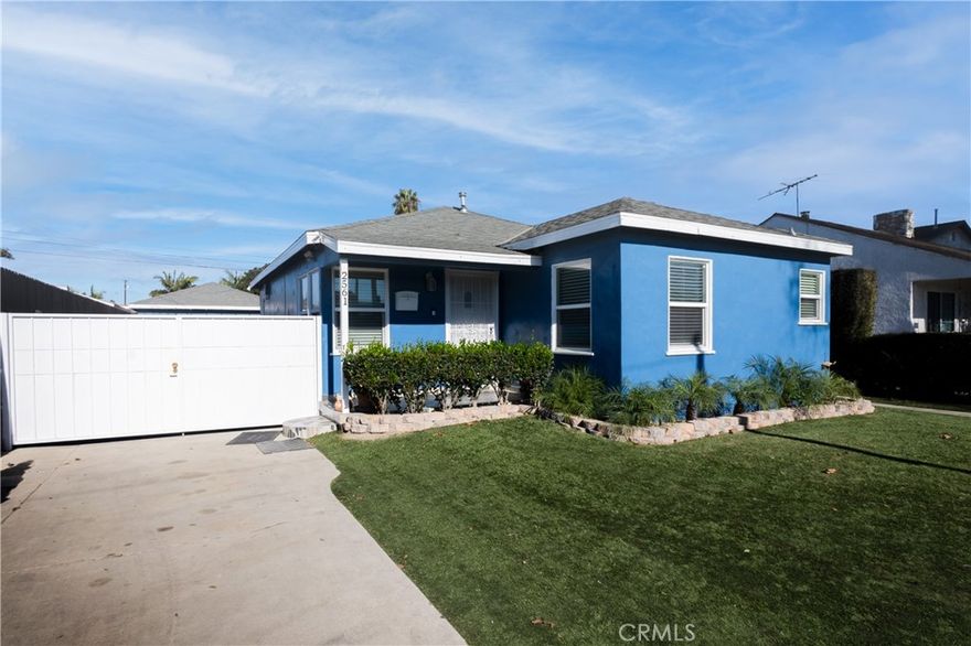 This charming two-bedroom home in desirable East Carson is perfect for first-time buyers. The bright, open-concept living area flows into a dining space with a spacious pass-through to the kitchen, ideal for entertaining. The kitchen features wood cabinets, large inlaid Spanish tile counters, and an inside laundry area.



The bathroom includes a large vanity and shower/tub combo. One bedroom fits king-size furniture; the other opens to a generous backyard with a BBQ area, cinderblock wall, and custom gazebo—perfect for relaxing or hosting guests.



Additional features include a custom bar, spa, original oak hardwood floors, crown molding, central AC/heat, and a long-gated driveway leading to a two-car garage.



Conveniently located near the 710 and 405 freeways, with easy access to the Dominguez Gap Wetlands for scenic trails and outdoor activities.