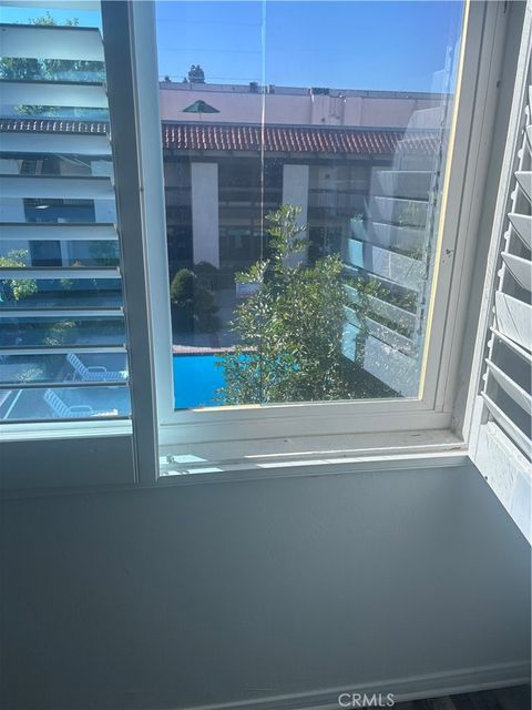 Photo of 5460 White Oak #K207, Encino, CA 91316 (MLS # IG25254129)