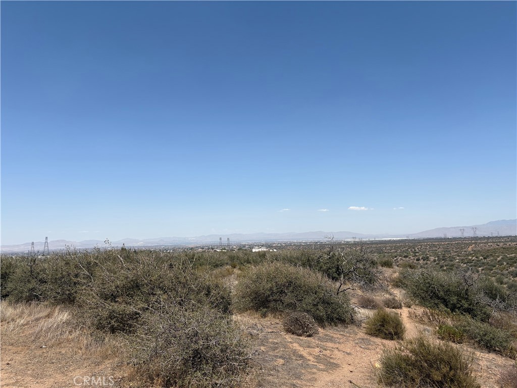 Unleash your imagination on this versatile vacant lot in scenic Phelan, California. Whether you envision a private equestrian estate, a custom home with sprawling gardens, or simply a place to escape the city, this 5 Acre parcel provides the ideal setting. Enjoy direct access to off-roading trails, hiking paths, and much more with the wide-open spaces that define Phelan's unique appeal.
There is plenty of houses in area and telephone poles, as well as fire hydrants within 1 minute or less. So should be fairly easy for utilities and water to be set up. Also it’s only 2 min off of paved road.
There is a Wash that runs through the property. It is hard to see it in the pictures, best to go in person and see for yourself. A Surveyor may be needed to identify property lines.