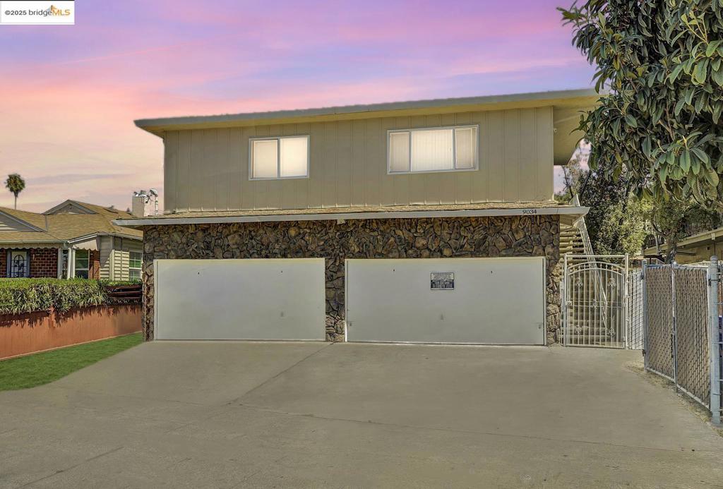 In the 2025 market, a deal like this is a unicorn. This 4-plex comes with an assumable 5.625% loan and is practically begging you to build wealth. It's your cheat code for real estate investing, house hack your way to financial freedom. Move into one of two pristine, freshly updated, vacant units, your choice of a 2-bed/1-bath or a 1-bed/1-bath. Let your tenants in the other three units, pay your mortgage. With two other units already tenant-occupied, you get instant cash flow from day one. Located in Castlemont, with a straight shot to the 580 for an easy Bay Area commute. On-site laundry and four extra large, 12ft high spacious garage storage spaces are really huge perks that keep tenants happy and rents flowing. The smart money is already dialing, it's up to you to take the opportunity and answer the call!