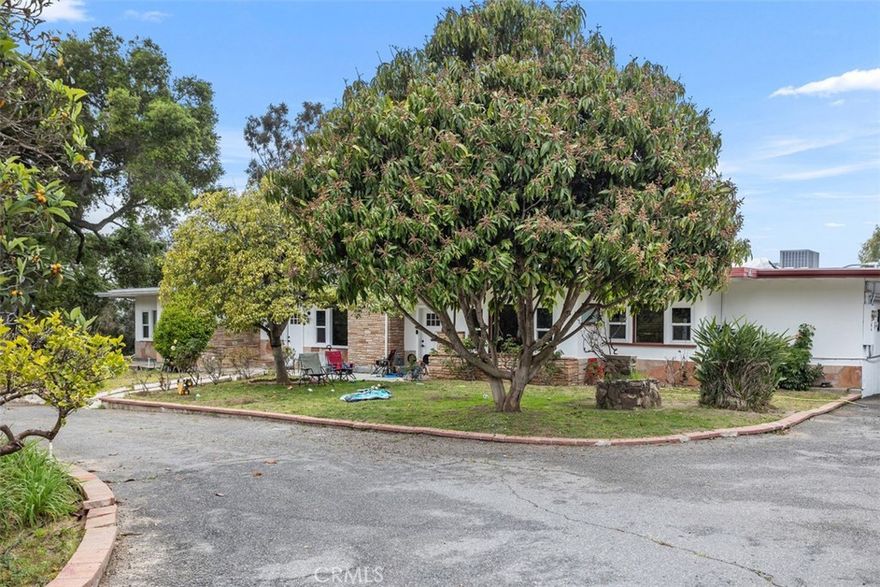 Nestled in the serene heart of Fallbrook, this fully remodeled 3-bedroom duplex offers an idyllic blend of modern comfort and natural beauty.

Situated on a spacious 2.5-acre lot, this home is a sanctuary of tranquility, boasting stunning views and lush grounds. As you step inside, you're

greeted by a beautifully remodeled kitchen, complete with new appliances, cabinets, and quartz countertops. The kitchen seamlessly flows into the

expansive great room, creating an inviting space for gatherings and relaxation. The primary suite is a luxurious haven, featuring direct access to

the backyard, a convenient washer/dryer setup, and an en suite bathroom with dual vanities and a walk-in shower. Two additional well-appointed

bedrooms offer ample space and comfort, while the second bathroom boasts a convenient walk-in shower. Throughout the home, brand new

laminate wood flooring adds a touch of elegance, complementing the modern aesthetic. Stay comfortable year-round with the newer energy-

efficient HVAC system, complete with a Nest thermostat for easy climate control. Outside, the property delights with its gated entry, long circular

driveway, and private backyard oasis. Whether you're hosting gatherings or simply enjoying a quiet evening under the stars, there's more than

enough space for relaxation and entertainment Conveniently located within walking distance to William Frazier Elementary and just a short drive

from shopping, freeways, and more, this home offers the perfect balance of seclusion and accessibility. Come experience the ultimate retreat in

Fallbrook!