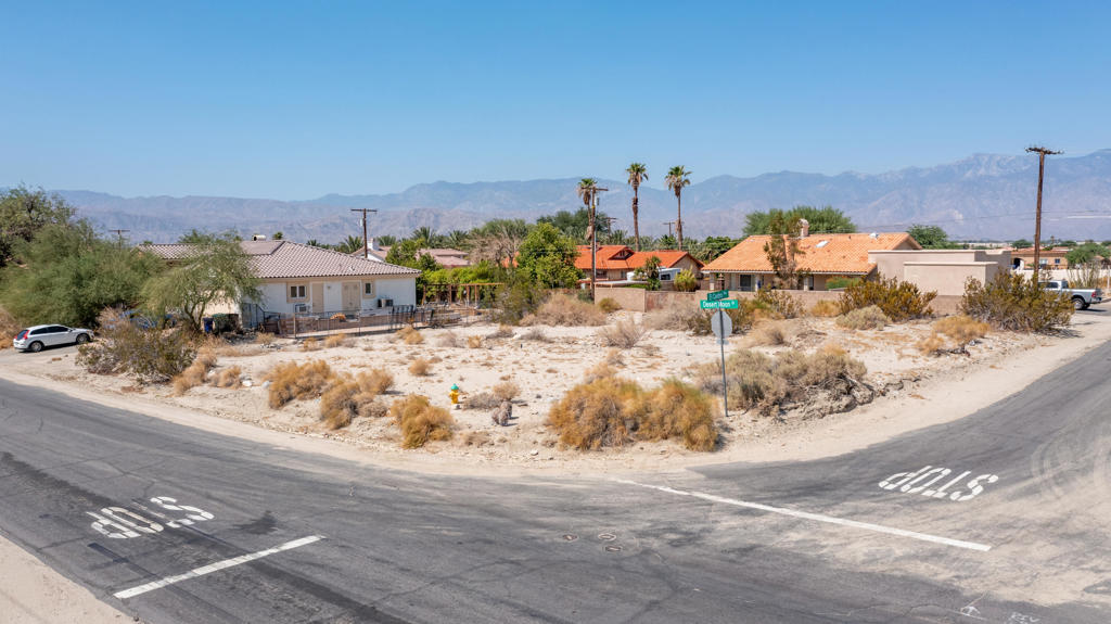 This exceptional corner lot, just over 1/4 acre, offers a rare opportunity to build your dream home in Thousand Palms. With unobstructed mountain views, easy freeway access, and close proximity to shopping and dining, this location is ideal for anyone seeking convenience and natural beauty. Corner lots like this are becoming increasingly scarce in the area, so don't miss out--act fast, as this property won't last long!* Please note - The address used is for marketing purposes only, this property does not have an assigned address. Lot lines in the photos are approximate.