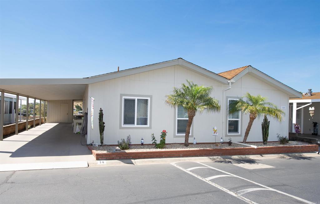 Mrs. Clean lives here. Beautifully maintained manufactured home in Foothills of San Marcos 55+park. Transition easily from a larger home as this home boasts 1760 square feet.Formal Living area with vaulted ceilings. Dual Pane windows for increased comfort. Stainless steel appliances- Maytag gas stove, built-in microwave and Whirlpool refrigerator. Family room off of the kitchen with french doors that open to the outdoor patio area. Good sized primary bedroom with two walk-in closets. Primary bath offers a soaking tub and a walk-in shower. Flooring includes attractive vinyl and neutral carpet. No steps to enter the home. Community clubhouse, tennis, swimming pool, card rooms, dog park and so much more. Onsite RV parking for a fee. HOA includes cable with HBO & Showtime. Park has solar panels and provides monthly credit towards electric bill. recorded 433A to accommodate financing.