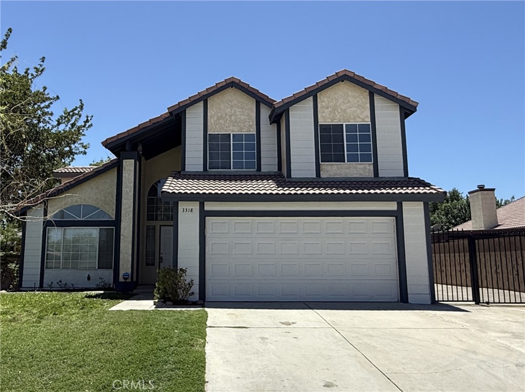 This tastefully updated home will not disappoint. Move-in ready with NEW exterior trim paint, NEW two-tone interior paint, NEW luxury vinyl plank flooring in living room and dining room, NEW plush carpet upstairs, NEW stainless steel Frigidaire kitchen appliances, and NEW Quartz counter tops in the kitchen and all bathrooms. High ceilings and loads of natural light throughout. Spacious floor plan with living room that opens to the formal dining room area, plus a separate family room with brick fireplace. Master bedroom features two mirrored closets, ceiling fan, dual sink vanity, and separate soaking bathtub and shower. Large 315 sq ft enclosed patio with a wood burning stove is a perfect space for lounging or entertaining. Spacious backyard with firepit and two sheds. Additional highlights include a downstairs laundry room, 2-car garage, and gated RV parking. All this in a great Westside neighborhood close to restaurants, shopping, schools, movie theater, and freeway access. Come and see it today!