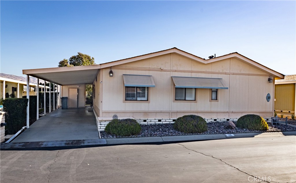 Located in Hemet with breathtaking views of Mount San Jacinto, welcome to Mountain View Park—a friendly 55+ community that offers a wonderful place to call home. This rare triple-wide has been lovingly maintained and offers over 1,700 sq. ft. of comfortable living.
Inside, you’ll find custom built-ins including bookcases, a desk, and a hutch, plantation shutters in the bedrooms that add both charm and function. The spacious kitchen features a built-in oven and stove, both in excellent condition, while the living area showcases a fireplace—an uncommon and special feature in mobile homes.
The home also has a new roof, less than six months old, with a custom skylight, patio cover in the backyard. With no rear neighbors, the backyard feels private and peaceful, perfect for enjoying the clear mountain views every day.
Schedule your private showing today and see why this home is truly special.