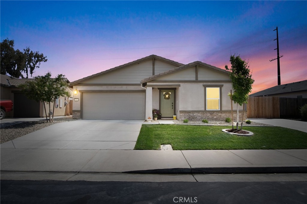 Welcome to this stunning 4-bedroom, 3-bathroom home in a desirable gated community! Boasting an open floor plan, this residence offers seamless living with modern touches and thoughtful upgrades. The main bedroom is a retreat, featuring a large walk-in closet and bathroom. Additionally there is a Jack and Jill bathroom which connects to two of the bedrooms. Enjoy the custom barn door in the laundry room and stylish window shades throughout. The living room is enhanced with an upgraded fan, and smart tech features include a smart security system, smart garage door opener, camera doorbell, and a smart stove. Benefit from the prewired electric vehicle charging system and paid solar panels for energy efficiency. Outside, you'll find an additional driveway with double gate access to the backyard, complete with a gazebo, extended concrete slab, and automated sprinklers. The community park adds to the appeal of this beautiful home.