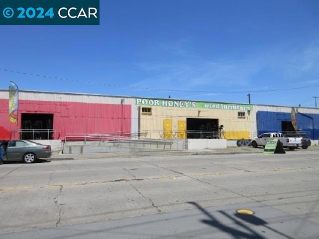 PRICED AT UNDER A $92.00 PER FOOT. The subject property consists of a 12,075 sq. ft. single story building on a 16,858 sq. ft. corner lot. The building is 1 story in height and is a metal building built on a concrete foundation. The property currently consists of a furniture sales and showroom building. The current CC-2 zoning is intended to create, maintain, and enhance areas with a wide range of commercial business with direct frontage and access along the City's corridors and commercial areas.