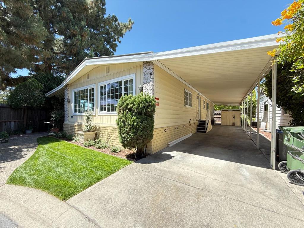 Explore this stunning 1975 home in the Quail Hollow Community. Discover the charm of this approximately 1,848 sqft residence, featuring 2 bedrooms and 2 bathrooms. Situated on a corner lot, its conveniently located near guest parking. The home has new waterproof laminate flooring throughout, complemented by new baseboards. The living room includes laminate flooring and a closet, while the family room is equipped with a ceiling fan with lights and a skylight. The kitchen showcases stainless steel appliances such as a microwave, stove, refrigerator, dishwasher, electric oven, garbage disposal, and features a pantry, upgraded single lever faucet, and ceiling lights. The master bedroom offers a walk-in closet and a mirrored closet. The guest bedroom includes a ceiling fan with lights and a skylight. The master bathroom features double sinks, a tub, a shower, and cabinets, while the guest bathroom offers a shower, tile flooring, and cabinets. Outdoor amenities include a backyard with a lovely garden and BBQ area, central air conditioning and heating. A utility room with laminate flooring and a dryer included. The home also features double-pane windows and a new ceiling and paint in the sunroom. Conveniently located near freeway 280 and shopping centers. Stop by today!