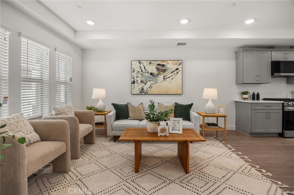 Heritage on First Apartments are conveniently located at the Northwest corner of 1st Street and White Avenue. The newly constructed apartment community is 1mile from the University of La Verne and a short walk to the La Verne Gold Line Station. The La Verne Gold Line will be operational by late Spring 2025 and once in service, a trip from La Verne to Pasadena will take approximately 31 minutes and approximately 60 minutes to downtown Los Angeles. The tri-level apartment units feature an open concept, attached 2-gar garage, stylish finishes, and all appliances, including gas range, microwave, refrigerator, washer, and dryer. The first level consists of the 2-car garage, foyer, and 1 bedroom and bathroom, while the second level features the kitchen, family room, dining area, 1 bedroom, and half bathroom. Finally, the third level contains the laundry room, two bedrooms and bathrooms, and a balcony overlooking the apartment community and surrounding amenities. The photos attached are the 3 bedroom, 3 bathroom floor plan. Available: July 1, 2025