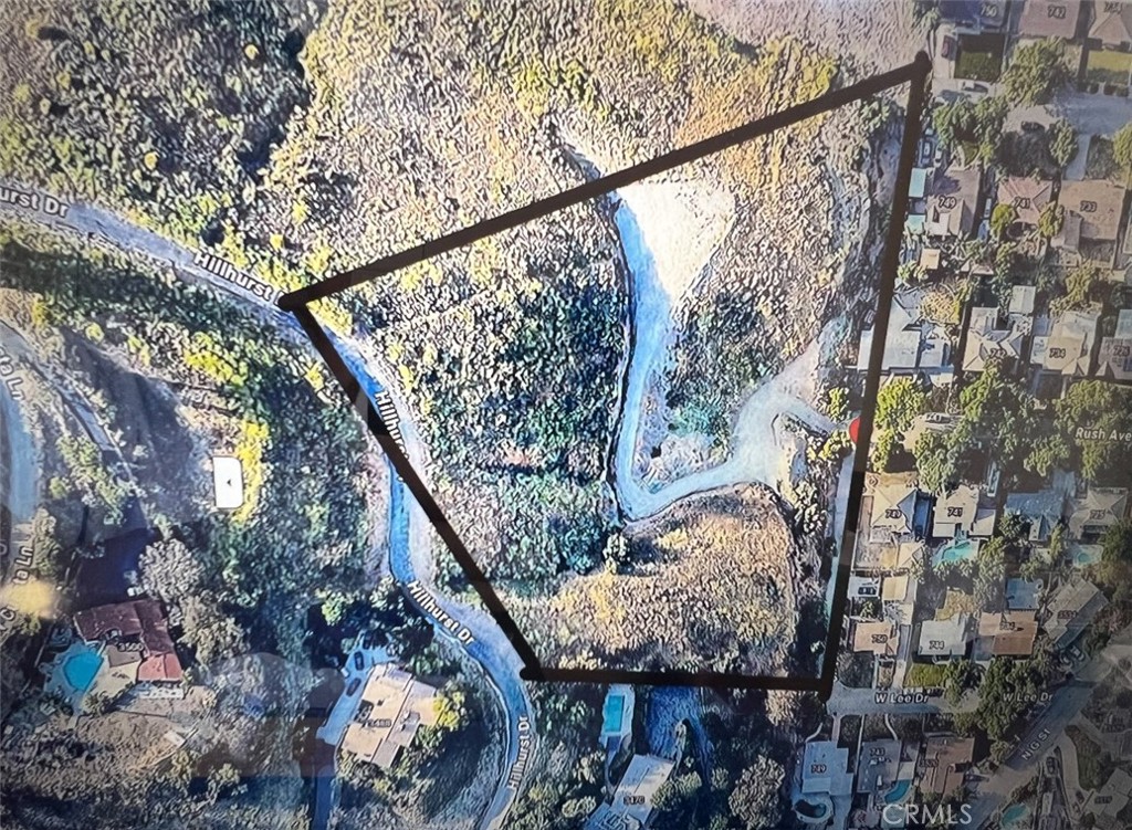 This 3.5 acre piece of land is ready for you to build your newest property with amazing views of the City and Mountains. A portion of this land has already been flattened out and owner has put gravel along the driveway. Zoned RL ( Residential Low Density ) per the city , you will be able to build up to 3 Properties. Entrance is on Rush Ave.