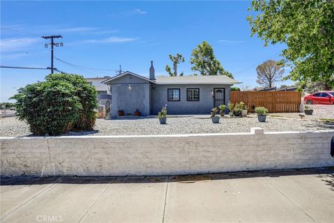 Photo of 16853 Forrest Ave, Victorville, CA 92395 (MLS # DW26089772)