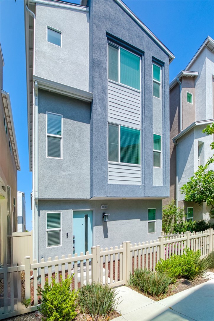 Welcome to this beautifully designed trilevel detached townhome in the desirable Lighthouse community of Stanton. Built in 2022, this contemporary residence offers 4 bedrooms, 3.5 bathrooms, and approximately 1,934 square feet of bright, airy living space. The home is equipped with modern finishes and smart home features, making it a perfect choice for today’s buyer. This home has a suite on the ground floor with a spacious bedroom and a full bathroom perfect for guests, office, or in-law suite. The hallway outside the ground floor suite connects to a spacious 2-car garage. Ascending to the main floor you will find a nice powder room and enjoy a spacious open-concept layout ideal for entertaining with a large living area, dining area connecting to a beautiful gourmet kitchen. The gorgeous kitchen features an oversized island with large granite countertop, sink with motion sense faucet, plenty of cabinets, walk-in pantry, stainless steel appliances, mosaic tile backsplash, walk-in pantry with hook ups for washer and dryer, and generous natural light. On the third level the primary suite has a walk-in closet, high ceilings, and ensuite bathroom with dual vanities and two additional bedrooms with shared full bath with bathtub and dual sinks. The home offers with smart home technology and provides great utility saving with paid off solar panels and complete gas free set up with all electric appliances. Enjoy Low HOA only $141 a month which covers maintenance for common areas, landscaping and other amenities such as picnic table, barbeque area and guest parkings. Easy access to major freeways (SR-39, Hwy 22, Hwy 91). Minutes from Stanton Central Park, Knott’s Berry Farm, Disneyland, Shopping and Commercial areas on Beach Blvd. such as Rodeo 39. With the asking price $880,000, far below market value and with all above amenities, this is indeed a home you would not want to miss!!!