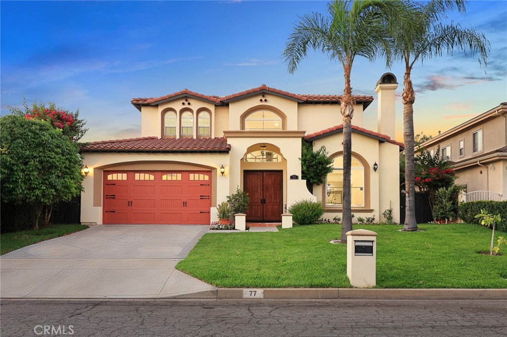 Welcome to 77 W Naomi Ave, a beautifully maintained two-story residence located in the heart of Arcadia. This home offers 4 spacious bedrooms with 4.5 bathrooms, plus an additional versatile downstairs room that can serve as a 5th bedroom or private office, making it ideal for multi-generational living or working from home. A bright upstairs loft provides extra space for a study area, media room, or playroom. Step inside to soaring ceilings, elegant archways, and abundant natural light. The open floor plan seamlessly connects the formal living room, dining area, and family room, creating an inviting setting for both everyday living and entertaining. The chef’s kitchen features modern finishes, ample cabinetry, and direct views into the lush backyard. Upstairs, the generously sized primary suite offers a walk-in closet and en-suite bath, while the additional bedrooms provide comfort and privacy for family and guests. Enjoy Southern California living at its best in the expansive backyard, complete with mature landscaping, a wide lawn, and plenty of room for outdoor dining or gatherings. The property also includes a two-car garage and a long driveway with extra parking.
Situated in a quiet neighborhood within the award-winning Arcadia Unified School District, just moments away from Arcadia High School, Santa Anita Park, and the Santa Anita Golf Course, and USC Arcadia Hospital .