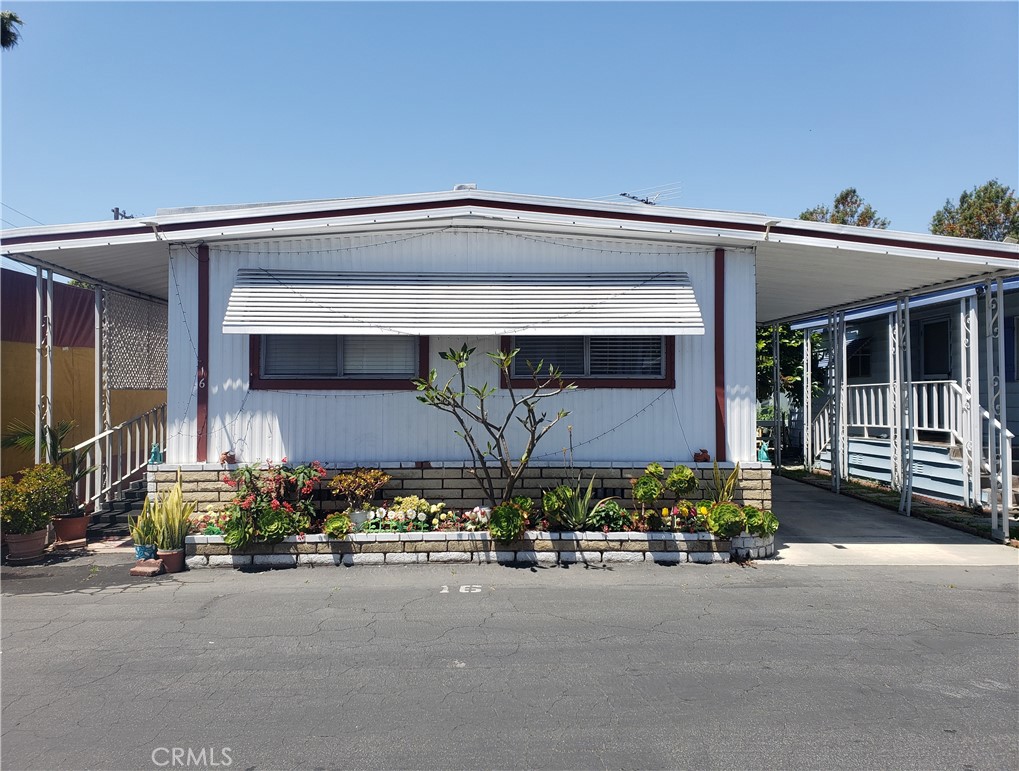 Quiet, peaceful, and well maintained Senior mobile home park Town and Country Villa. Move in condition. 2 bedrooms, 2 bathrooms and 800 sqft spacious and bright airy living space. Home offers large living room, master bedroom, dining room area, 1 car port and abundance of community parking spaces. Washer and Dryer inside. Registered owner has to be 55+ year old and 2nd person is 40+ year old. Low lease space for only $1,100 per month.
Amenities include spacious clubhouse for special and important events, multiple guest parking spaces, and swimming pool. Conveniently close to restaurants, stores, and supermarkets
