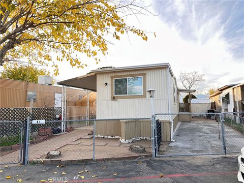 Photo of 9426 Tamarisk Avenue #81, Hesperia, CA 92345 (MLS # HD26076689)