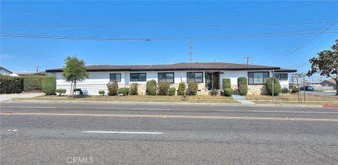 Photo of 1345 W 124th ST, Los Angeles, CA 90044 (MLS # DW26175676)