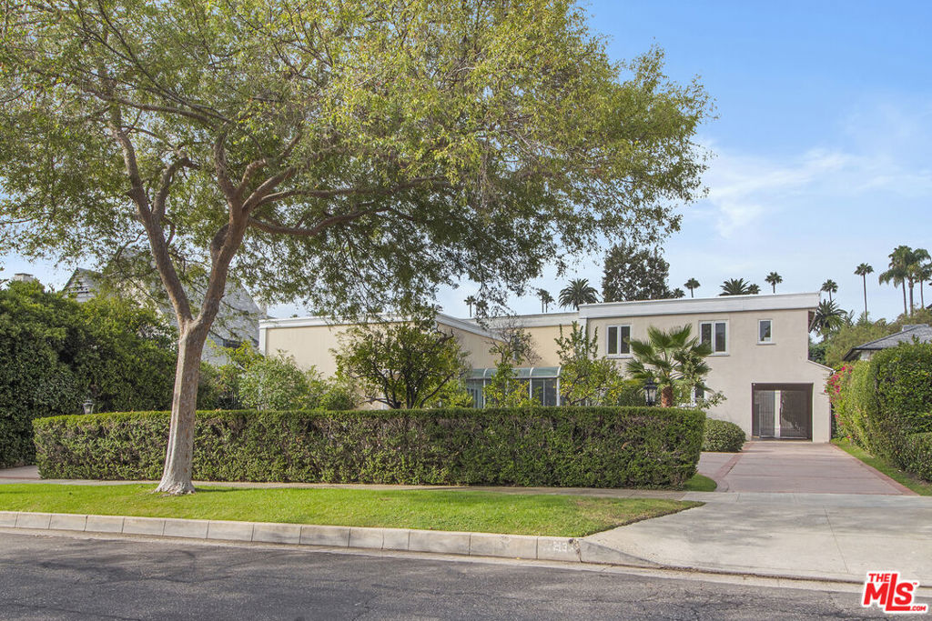 Offers due Sunday, Sept. 21st at 4pm. On a street that ranks 11 out of 10 for prestige, this Hollywood Regency Gem offers endless potential in the very heart of the Beverly Hills Flats. The address alone is priceless, paired with a flat 16,650 sq ft lot and approx. 6,200 sq ft of living space just waiting for its next chapter.Yes, it's a fixer. But behind the peeling paint and worn glamour lies the opportunity of a lifetime: a shimmering pool framed by neoclassical columns, a sunken bar made for martinis, and a home that once hosted fashion icons, famed surgeons, and neighbors straight out of the Beverly Hills legend book. Restore the sparkle or design a new architectural masterpiece... this opportunity is as rare as the location itself. With Rodeo Drive, World Class dining, and the very best of 90210 just moments away, this more than an address, it's a chance to write the next great Beverly Hills legacy. One family has cherished this home for over 50 years. Opportunities like this don't just come around- they mark the end of an era and the beginning of a new chapter in Beverly Hills history.