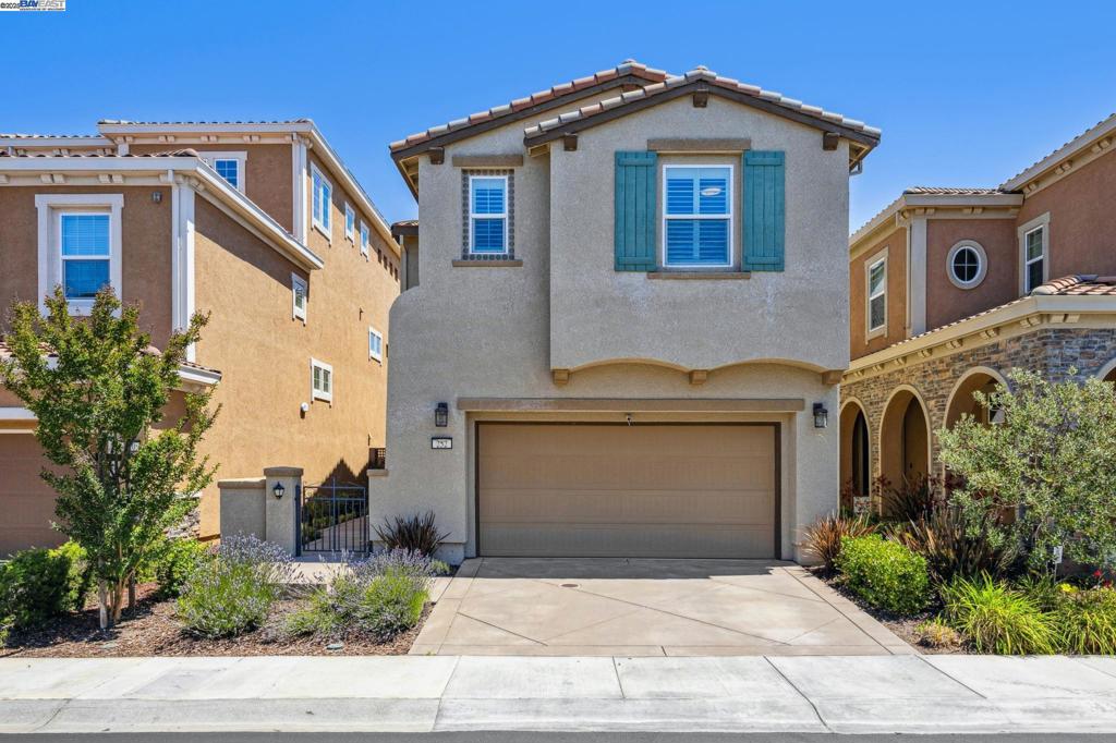 Situated along the lush fairways of the Stonebrae Country Club golf course, this rarely available 4 bed, 3 bath, 2,278 sq ft home offers serene views, modern elegance, and resort-style living in one of the Bay Area’s most prestigious gated communities. With no rear neighbors and just a short walk to the luxurious clubhouse, this home offers the best of comfort and convenience. The open-concept great room welcomes you with warm natural light, rich wood flooring, and a cozy gas fireplace. The chef’s kitchen is a true showstopper, featuring a sprawling center island, crisp white cabinetry, quartz countertops, stainless steel appliances, and designer lighting. The adjacent dining area is perfectly positioned to enjoy tranquil golf course views through expansive windows. A rare and desirable ground-level bedroom and full bath provide flexibility for guests, extended family, or a private home office. Upstairs, you’ll find a spacious loft, two secondary bedrooms, a full bath, and a convenient laundry room. The luxurious primary suite serves as a private retreat with two large walk-in closets, a spa-inspired bathroom with a sunken tub, dual sinks, and a balcony that looks out over the fairways. As one of the most affordable homes in Stonebrae, this property delivers exceptional value.
