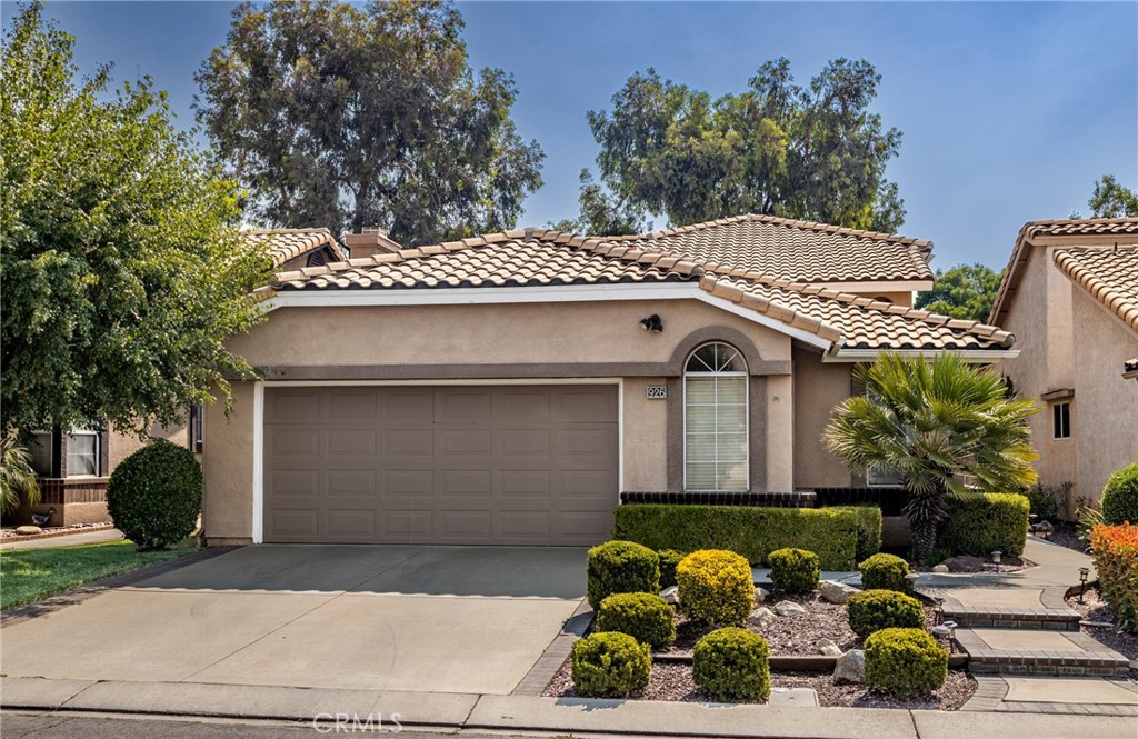 This is a home located within the desirable community of Sun Lakes Country Club in Banning. The two-story 1837 Square feet home offers a primary bedroom downstairs with an en-suite bathroom, a walk-in closet, a living room, a dining room, a family room next to the kitchen with a view of the backyard. There is a bedroom upstairs and a full bath, and a cozy loft that can be converted to a bedroom. The kitchen is equipped with stainless steel appliances, a refrigerator and ample cabinetry. The landscape is well maintained offering beautiful curb appeal. The backyard of this home is directly next to the golf course granting a magnificent view sitting from your back porch. The 55+ resort style community features guard-gated entry, golf courses, restaurants, tennis courts, pickleball/paddle ball courts, beautiful swimming pools, gyms, a variety of social events including dancing, music, games, sewing, billiards, and bocce ball, as well as a beautiful library and so much more! Make this your dream home today.