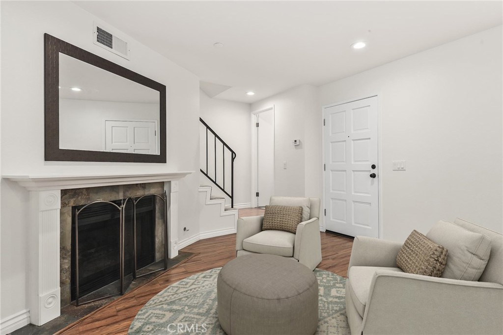 Welcome home to this beautifully updated and maintained three-bedroom, two and a half bath condo in the heart of Alhambra. Nestled on a quiet, tree-lined street just minutes from the heart of Downtown Alhambra, renowned for its restaurant row, charming cafes, and shopping centers, this spacious townhouse-style condo offers the perfect blend of comfort, style, and convenience. Located just 3 minutes to South Pasadena, a 5-minute walk to Target and Costco, and only 10 minutes to Old Town Pasadena's vibrant shopping & restaurants.
Step inside to find gorgeous hardwood floors throughout, a large modern kitchen with an eat-in island, and elegant countertops in both the kitchen and bathrooms. Enjoy the upscale touches of recessed lighting, custom window shutters, and tasteful light fixtures that add warmth and sophistication to every room. Features of this property that make it such a great home include an the updated kitchen with new Quartz countertops and refinished cabinets, updated bathrooms, spacious primary suite, new recessed lighting, new carpet, new interior paint, custom closet organizers, newer HVAC system (5 years old), and new front yard landscaping. The community is gated and features one of the lowest HOAs in the area at $138 per month. This includes coverage for water, trash, interior fire sprinklers, exterior insurance, and maintenance of all common areas. This home has been priced to sell! Don't miss your chance to own this beautiful home in one of the most prime and desirable locations!