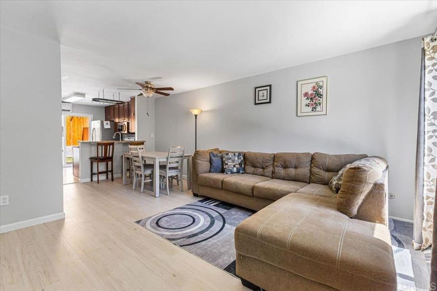 Welcome to your private retreat in San Carlos, just steps from Mission Trails. This ground-floor corner condo has been thoughtfully updated, blending modern comfort with a lifestyle that feels connected to both nature and community.  The kitchen features granite countertops, updated appliances, and plenty of cabinet space. Fresh paint, new flooring, and split A/C units in every room create a clean and inviting atmosphere. The spacious living area opens to your private backyard patio with low-maintenance turf and direct access to the greenway — a rare feature perfect for morning coffee, evening relaxation, or entertaining friends.  Practical upgrades include a new water heater, two dedicated carport spaces, and community laundry located in the garage right outside your door, shared with only four other units.  The community itself offers resort-style amenities, including a gated pool, playground, basketball court, and recreation area ideal for barbecues and gatherings. Tucked away from main streets, the neighborhood is peaceful and quiet while keeping you close to shopping, dining, schools, and some of the best hiking in San Diego.  This San Carlos gem is move-in ready, meticulously maintained, and offers the perfect balance of modern living and outdoor lifestyle!!