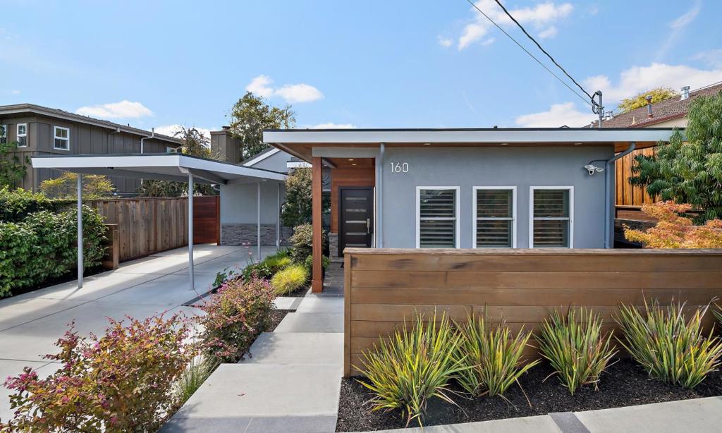 This thoughtfully renovated turnkey home blends mid-century modern charm with stylish contemporary updates, offering the perfect balance of comfort and sophistication. Featuring 3 spacious bedrooms and 2 remodeled full bathrooms, the open-concept living and dining areas are bathed in natural light, creating an airy, inviting space ideal for everyday living and entertaining. The beautifully updated kitchen is a chefs dream, boasting Calacatta granite countertops, stainless steel appliances, and dual wine and beverage fridges. Warm hardwood floors run throughout most of the home, enhancing the cohesive and welcoming atmosphere. Step outside to an expansive wraparound deck that flows seamlessly to a lower stone patio complete with a pergola, seating area, and outdoor bar ideal for effortless indoor-outdoor living. A detached backyard cottage adds flexibility as a home office, gym, or creative studio. Modern conveniences include central A/C, a Nest thermostat, Ring security system, and an EV charger. Located just minutes from vibrant Downtown San Carlos, top-rated schools, local parks, and major commuting routes, this home truly has it all.