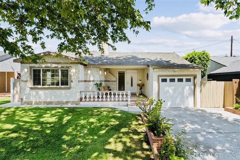 TURNKEY | FULLY REMODELLED | 2 PRIMARY BEDROOMS + 3RD BEDROOM | SINGLE STORY | PRIME LOCATION | Welcome to this beautifully upgraded single-story home in the heart of Long Beach, located in a mature and well-established neighborhood. This home has it all—style, space, and smart upgrades—offering the perfect setting for Southern California living. You’ll be instantly drawn to the oversized front patio, thoughtfully refinished with elegant stonework and centered around a tranquil bubbling fountain. It's the perfect place to enjoy your morning coffee or unwind in the evening with friends. Step inside to a spacious, light-filled living room featuring a large gas fireplace with a striking quartz mantel—perfect for cozy nights in. The layout flows seamlessly into the chef’s kitchen, designed with entertaining in mind. Enjoy quartz countertops, a gas range, upgraded cabinetry, and an extended breakfast bar, flooded with natural light. The adjacent dining area is bright and inviting—ideal for hosting dinner parties or casual family meals. A sliding glass door connects the dining room to the backyard, making indoor/outdoor gatherings effortless. The primary ensuite bedroom is your private retreat, complete with double closets and direct backyard access through another sliding door. The ensuite bath features a walk-in shower, frameless glass door, custom tilework, upgraded lighting, quartz counters, and a linen closet for added storage. A rare second primary bedroom also offers its own ensuite bathroom with a walk-in shower—perfect for guests or multigenerational living. Bedroom three is well-sized and flexible, ideal as a home office or guest room. The backyard is an entertainer’s dream, boasting a large patio, high privacy fence, and a storage shed. The single-car garage houses additional storage and laundry area, while the extended driveway and plentiful street parking provide ample space for vehicles. Additional upgrades include dual pane windows, copper plumbing through most of the home, recessed lighting, ceiling fans, and a permitted extension. Close to Amazon Fresh, Starbucks, Long Beach Airport, top-rated schools, dining, and shopping—this is the one you’ve been waiting for!