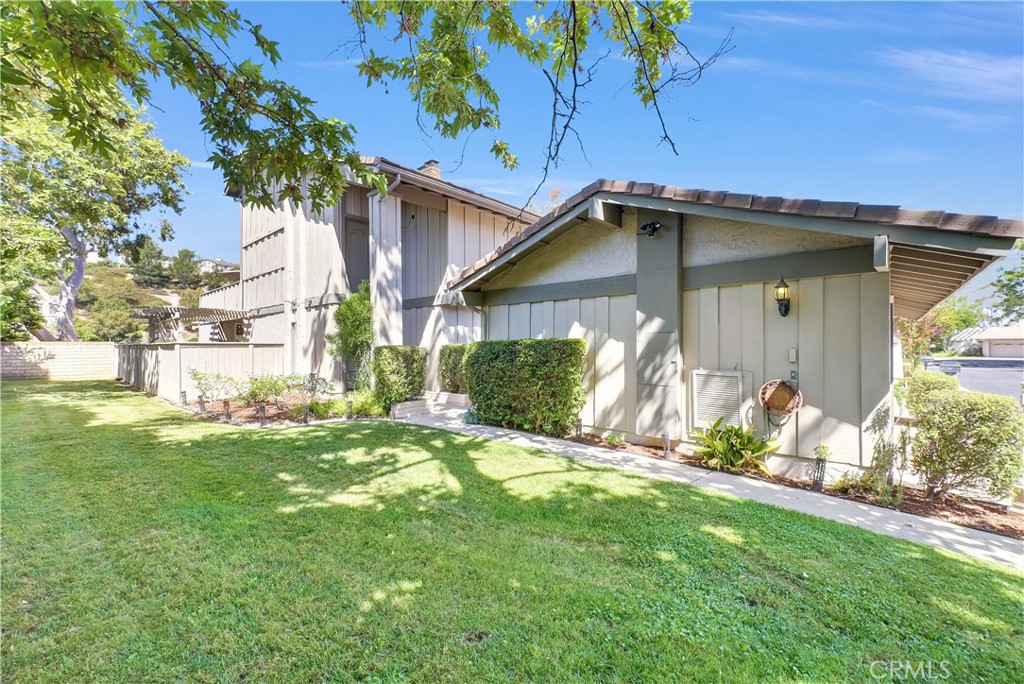 Welcome to this beautifully upgraded residence located in the highly desirable Galerie Community of Anaheim Hills. This corner lot location allows for ample natural light to flow through the space. This attached single family home features the largest (2,312 sq ft) & most spacious floorplan in the entire community, offering generous living space, thoughtful design, and elegant upgrades throughout. The HVAC system and electrical panel have been recently upgraded. The main level includes a spacious bedroom currently used as a home office, along with a convenient powder room that can be converted into a full shower bathroom. A private atrium, courtyard, and backyard provide spaces for entertaining and/or relaxing. Upstairs, you will find a true primary suite retreat featuring a soaking tub, a separate shower, dual closets, and a private deck. An upstairs guest suite with its own ensuite bath provides flexibility and privacy for visitors or multigenerational living. A prime location within a quiet and private neighborhood close to parks, a golf course, a community clubhouse, shopping, and top-rated schools. Please come to check out today and make this house your new home!