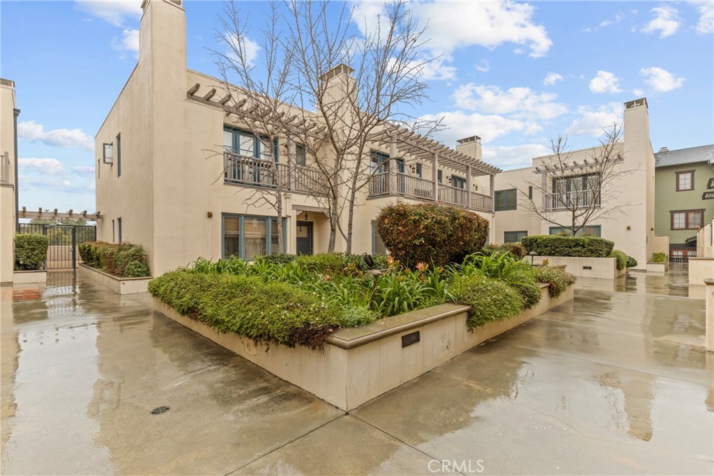 Welcome to this beautiful rare-to-find condo in the heart of South Pasadena. It offers the perfect balance of modern city living and comfort.The open-concept living and dining areas provide ample space for both relaxation and entertaining, with direct access to a private balcony that offers a peaceful retreat with views of the surrounding area. Each bedroom is spacious with plenty of natural lighting, spacious closets, and have their own full bathrooms within each suite to add convenience. Two garage parking spaces, in unit laundry, and triple pane windows throughout. Enjoy the vibrant atmosphere of South Pasadena, with easy access to shops, dining, and public transportation, all while enjoying the peace and tranquility of this well-maintained condo. Plenty of street and public garage parking available for your guests. The HOA covers water, trash, fire and liability insurance for the exterior, and general maintenance. Come see this charmer!