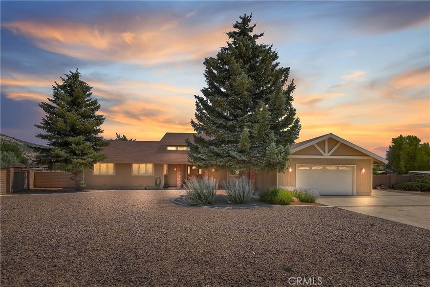 Spacious Mountain Home on Nearly 1 Acre – Pickleball Court, Multiple Garages & Lush Landscaping Welcome to 908 Mount Doble Dr, a rare Big Bear City property offering 2,738 sq. ft. of living space on a generous 41,288 sq. ft. (.95 acre) lot. Priced at $855,000, this home delivers exceptional value at just $312 per sq. ft.—a standout in today’s market. Inside, you’ll find 3 bedrooms, a den/optional 4th bedroom, 2.5 bathrooms, and 8 total rooms, providing flexibility for full-time living, a vacation getaway, or multi-generational needs. The open layout, family room, Vaulted ceilings, huge loft, atrium and mountain-inspired finishes make this home both functional and inviting. Outdoor living shines here. Enjoy your own pickleball-tennis court, mature fruit trees, and manicured landscaping across a nearly 1-acre parcel. Multiple outdoor seating areas create an amazing setting for relaxing or entertaining. Car and toy enthusiasts will appreciate the oversized attached garage, additional detached garage, and expansive paved parking—ideal for RVs, boats, or multiple vehicles. With public utilities, a level lot, and paved access, this home is ideal for year-round enjoyment. Located just minutes from Big Bear Lake, Snow Summit, Bear Mountain, and the Village, you’ll have quick access to shopping, dining, and outdoor recreation—while still enjoying the space and privacy this lot provides. Key Features: 2,738 sq. ft. of living space | 41,288 sq. ft. (.95 acre) lot Competitive price at $312/sq. ft. 3 bedrooms + den/optional 4th bedroom, 2.5 bathrooms pickleball court Multiple garages & abundant parking (RV/boat friendly) Mature fruit trees & landscaped grounds Close to lake, ski resorts, and Village