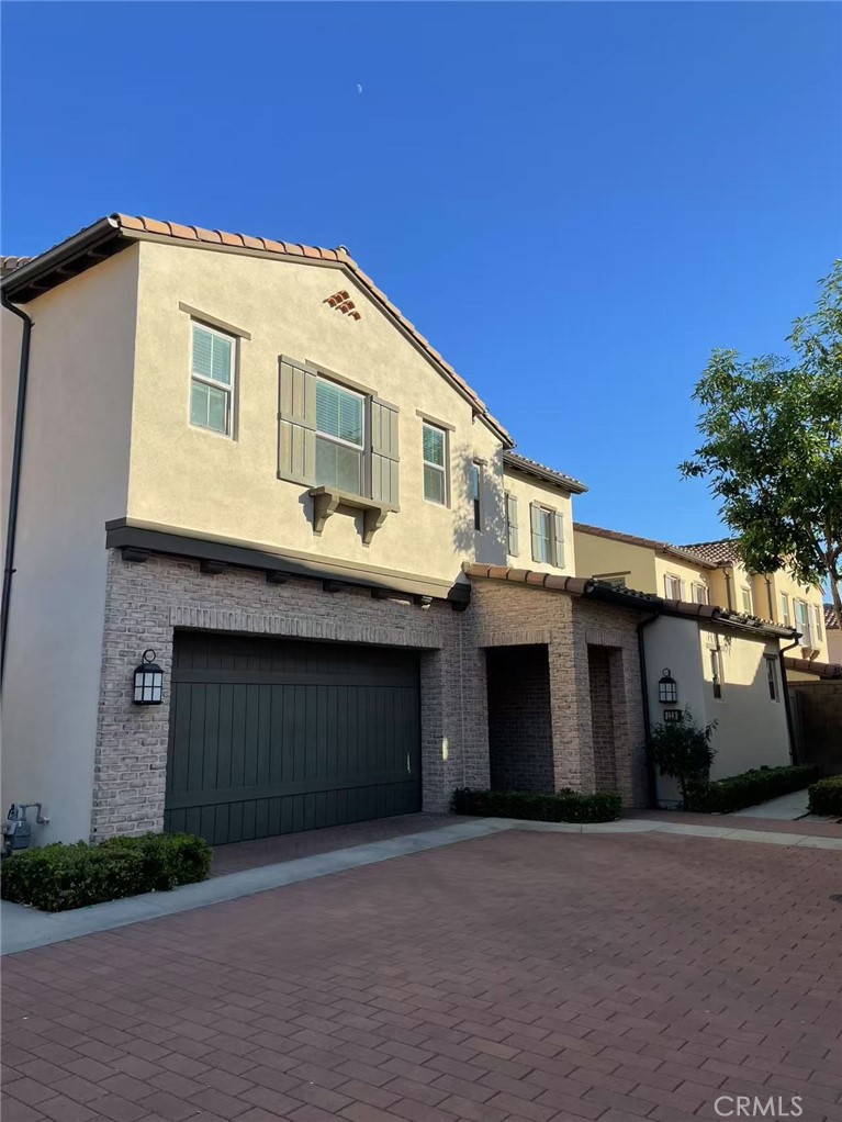 Beautiful Detached Home Located in the Highly Desirable Eastwood Village. Two story with 4 bedrooms and 3 bathrooms. First floor bedroom with en-suit bath, great for guests or extended family. Gourmet kitchen, large center island, stainless-steel appliances. Master suite offers large walk in closet, dual sink and separate tub and shower. Downstairs individual laundry room. Tankless water heater in the garage. brick pavers and planting in the backyard. Community has Club House, Swimming Pool, Spa, Tot lots, BBQ grills. Shopping Center, Schools, Restaurants nearby. Walking distance to Eastwood Elementary School and Community club house.