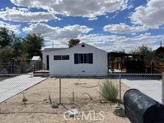 Beautiful Joshua Tree Village Single Family Home! Location, Location, Location! This 2 bedroom, 1 bath home offers newer copper plumbing throughout, newer roof and mini-split system, porcelain tile flooring, upgraded bathroom, large dining room area, laundry room, a bonus room for office or workout room. The big back yard has endless possibilities. Currently registered as an airbnb. Lots of potential. JT/RM Zoning. An additional Single Family Home may be possible. Buyers to verify and do their due diligence.