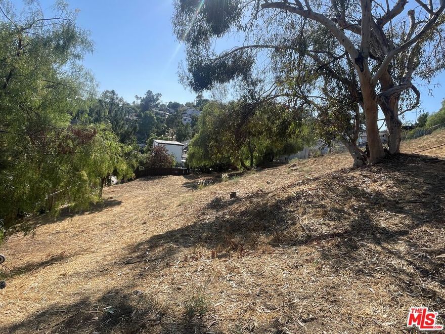 Prime Mount Washington building opportunity! Whether you are a developer, investor, or simply envisioning a custom hillside retreat, this combined offering includes a 6,340 sq ft buildable lot at 434 Cedar St and an adjacent 5,938 sq ft parcel at 442 Cedar St, totaling 12,278 sq ft. The property features excellent hillside and city views in a highly sought-after NELA location. Surrounded by vibrant neighborhoods such as Cypress Park, Highland Park, Glassell Park, and Eagle Rock, and just minutes from Downtown LA, it provides convenient access to the city while maintaining a peaceful hillside setting. Nature enthusiasts will appreciate nearby Heidelberg Park and Moon Canyon Park, while dining and shopping along York Blvd and Figueroa are only moments away.  Please note: These lots are located on a "paper" section of Cedar St and will require the buyer to extend Cedar St approximately 100 feet to gain buildable access and secure necessary permits from the city. The boundary/topographic map for the two lots is available in the Doc(s) section.  The seller is open to owner financing and flexible terms with at least 100K down.