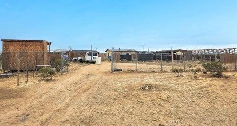 Photo of 43111 260th St E, Lancaster, CA 93535 (MLS # CV26177995)