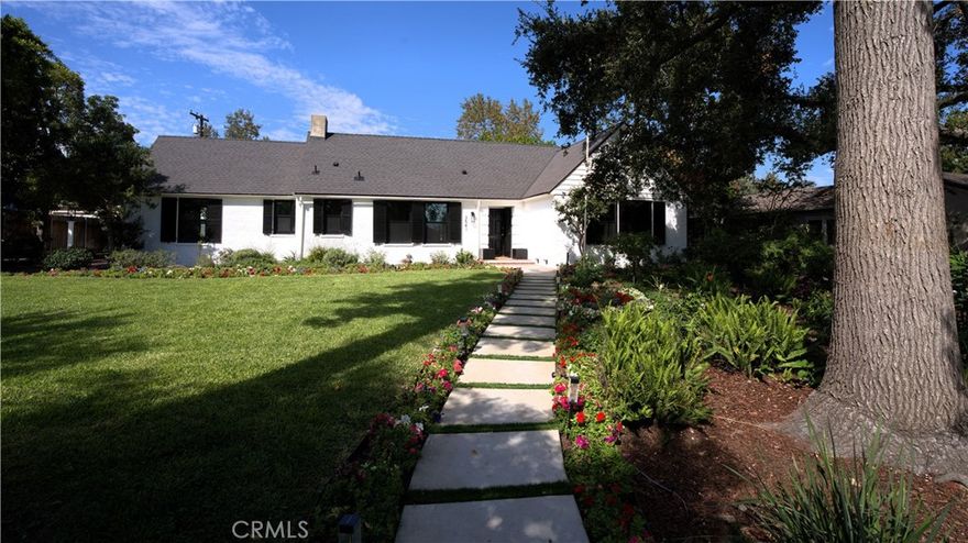 Introducing 3541 Yorkshire Road, a beautifully reimagined English Cottage style single-story residence in the prestigious Chapman Woods neighborhood of Southeast Pasadena. This rare south-facing home offers abundant natural light and positive Feng Shui energy, creating a private haven where every angle feels like living in a lush, curated garden. Just moments from San Marino, Arcadia, and San Gabriel, it blends timeless architectural charm with refined modern luxury.



Every detail of the 2,417 sq. ft. main residence has been thoughtfully crafted to reflect designer sophistication and comfort. The expansive open kitchen is a true centerpiece, showcasing a dramatic waterfall island, Thermador appliances with built-in refrigerator, and generous prep space—perfect for both everyday living and elegant entertaining. Sunlight pours in through brand-new Milgard windows, while the home features a new roof with upgraded insulation, new plumbing throughout, a newer electrical box, a 2024 water heater, and a central HVAC system for year-round comfort and efficiency.



Elegant flooring, designer-selected colors, and curated style choices elevate the home’s interior aesthetic. The living room opens to a new deck with custom bi-fold sliding door, creating a seamless flow between indoor and outdoor spaces. Professionally designed landscaping with garden-inspired plantings, mature greenery, and stylish concrete details surrounds the property, providing a tranquil retreat reminiscent of a private garden. Inside, a custom designer fireplace anchors the graceful floor plan, and all three ensuite bedrooms offer their own sanctuary of comfort and privacy.



A detached 224 sq. ft. guest house features a fully renovated bathroom and new mini-split AC system, providing an ideal space for guests, a home office, man-cave or creative studio.



Adding to the property’s one-of-a-kind charm, majestic peacocks often visit the garden—sometimes with their offspring—gracing the front yard with color and life. While most people only see these beautiful birds at the zoo, here they’re your gentle, everyday neighbors, enhancing the home’s sense of serenity and wonder.



Set within a quiet, walkable neighborhood, this English Cottage style, south-facing home captures the very essence of Pasadena luxury living—combining character, elegance, privacy, and the extraordinary experience of living in your own garden.